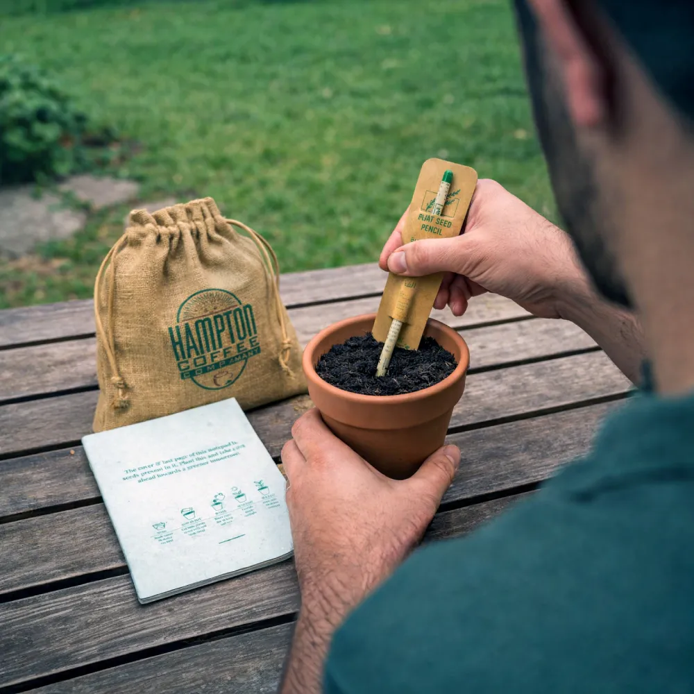 Sustainable 'Plant a Seed' gift set in eco-friendly jute pouch with plantable pencil and seed notepad